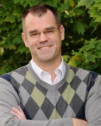 Carl Johengen guests conducts the Syracuse Vocal Ensemble