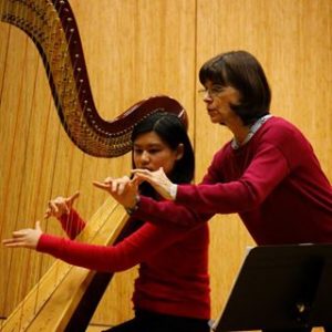 Harpist Nancy Allen gives instruction during a masterclass