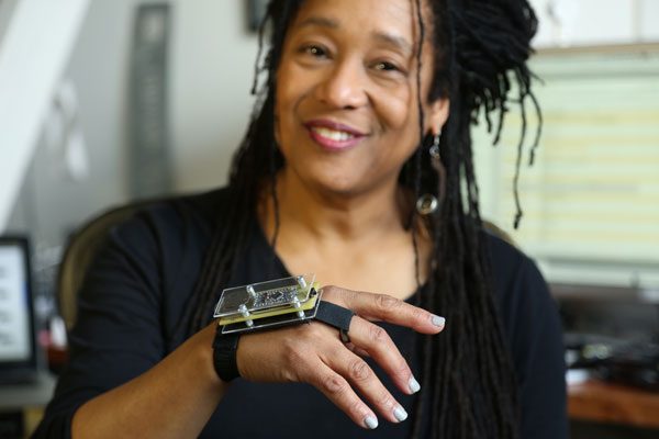 Pamela Z in her San Francisco Studio wearing a SensorPlay controller.

photo credit: Goran Vejvoda