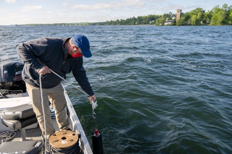Jefferson Project Research Specialist Brian Mattes samples algae and cyanobacteria with a device called a FlouroProbe while conducting tests on Chautauqua Lake Thursday, May 27, 2021. Members of the Jefferson project have been on the grounds this week conducting research into the health of Chautauqua Lake. Photo by Dave Munch/Chautauqua Institution